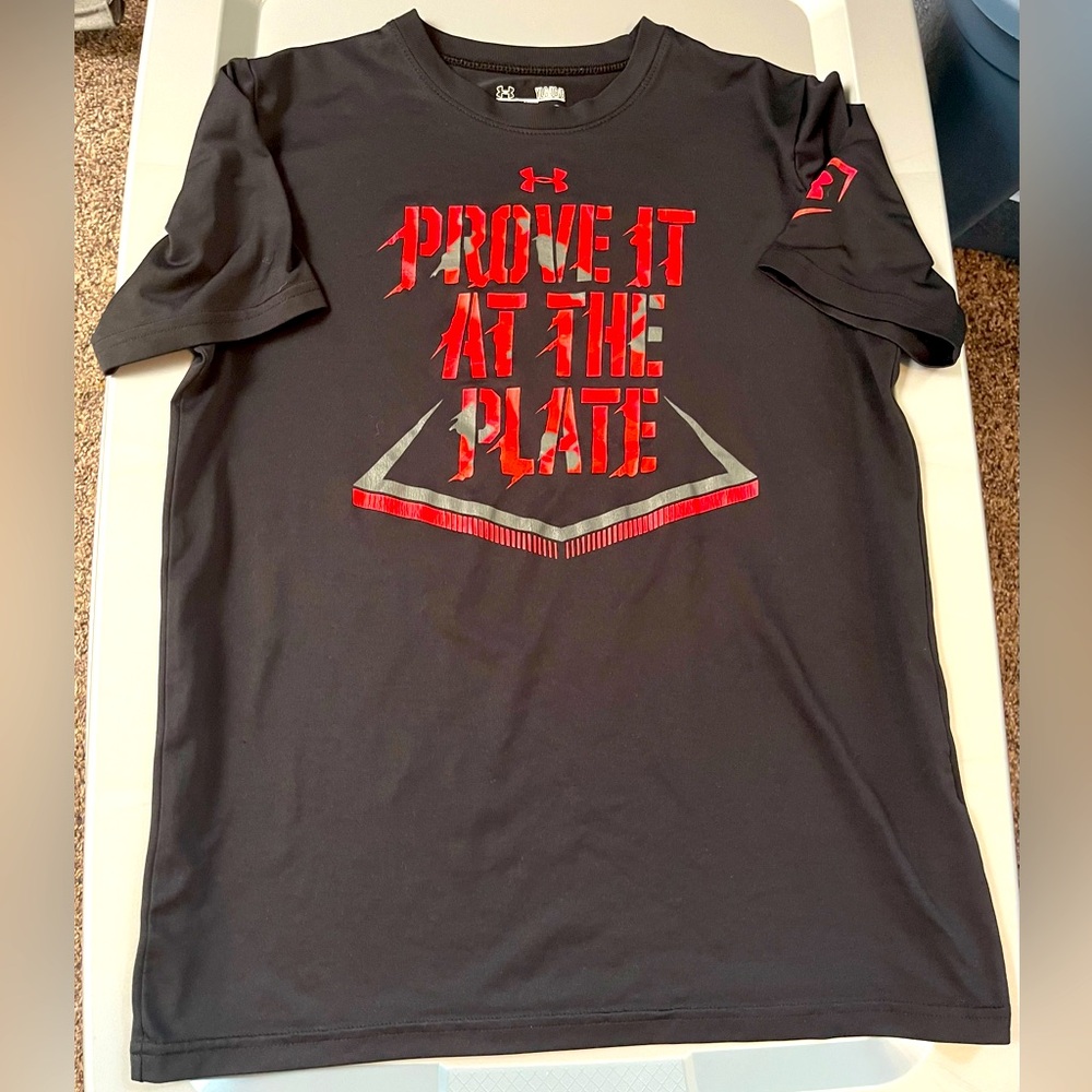 Under Armour boys size large black and red dri-fit short sleeve shirt.